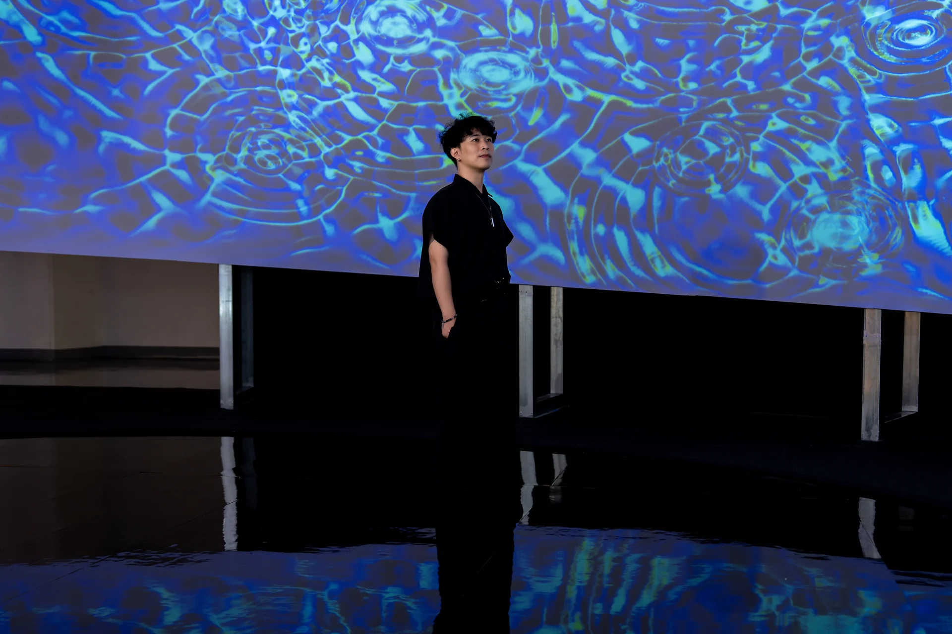Cymatics of Life on site: Standing before the wall, ripples spreading behind
