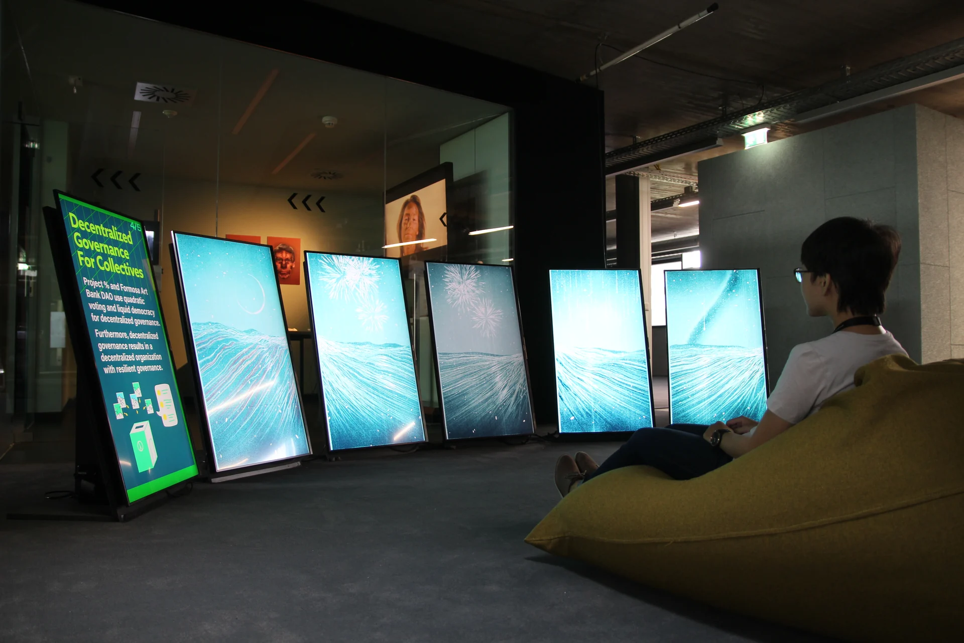 All five screens playing Prairie, beside a board on governance