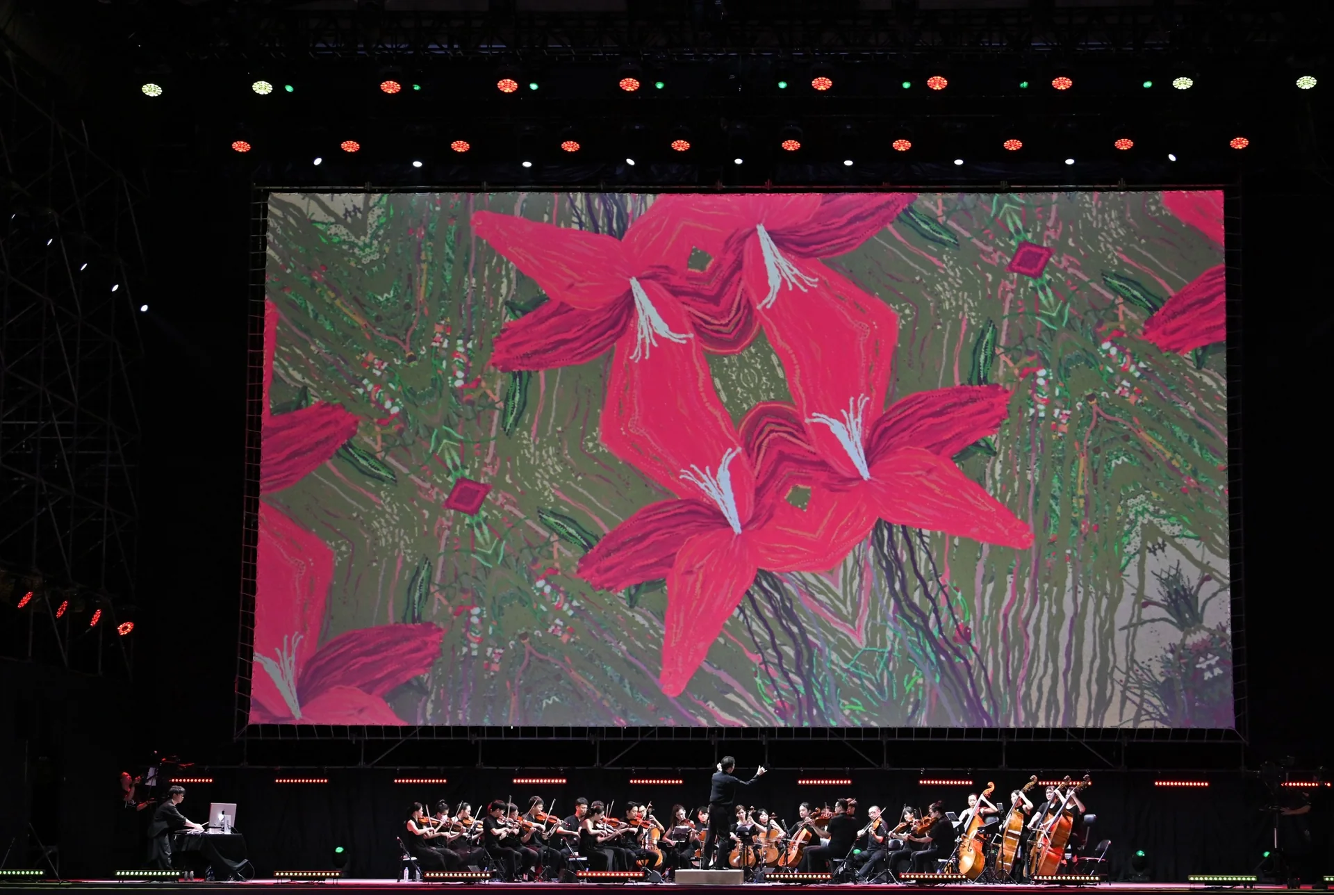 The Soul of Flowers on the stage screen at Sacred Forest