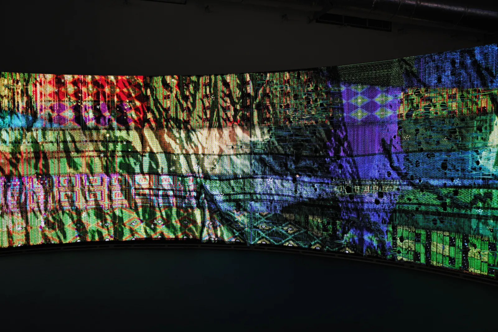 Woven Land, Woven River on site: Diamond pattern and bands of colour in the cloth