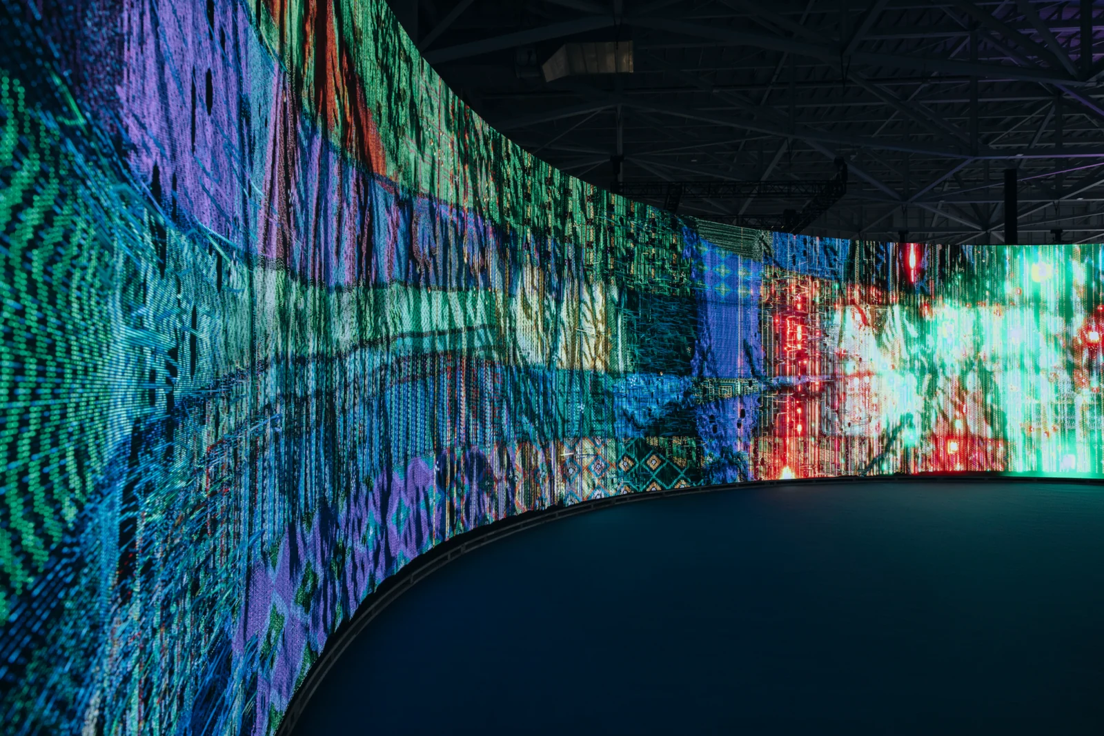 Woven Land, Woven River in the pavilion: The cloth hugging the curve, from near to far
